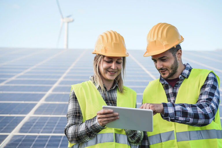 young-people-working-with-digital-tablet-at-renewa-52ZG9XA.jpg